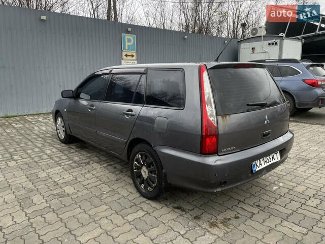 Серый Мицубиси Лансер, объемом двигателя 1.6 л и пробегом 667 тыс. км за 2999 $, фото 5 на Automoto.ua