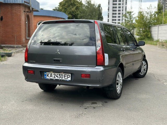 Сірий Міцубісі Lancer, об'ємом двигуна 1.6 л та пробігом 240 тис. км за 4600 $, фото 6 на Automoto.ua