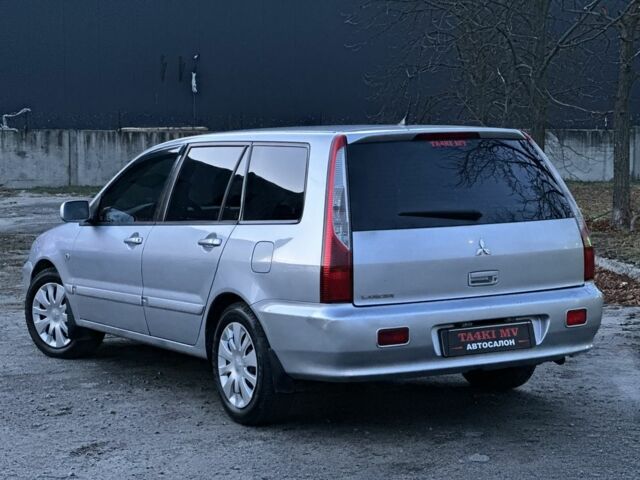 Серый Мицубиси Лансер, объемом двигателя 1.6 л и пробегом 220 тыс. км за 3999 $, фото 4 на Automoto.ua