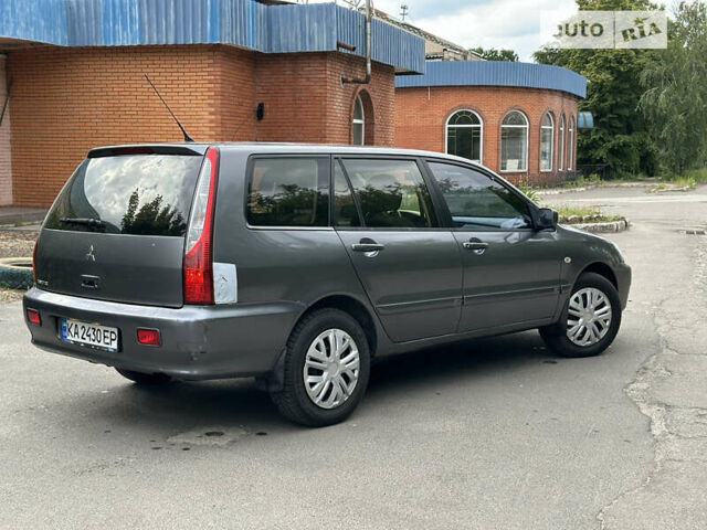 Сірий Міцубісі Lancer, об'ємом двигуна 1.6 л та пробігом 240 тис. км за 4600 $, фото 5 на Automoto.ua