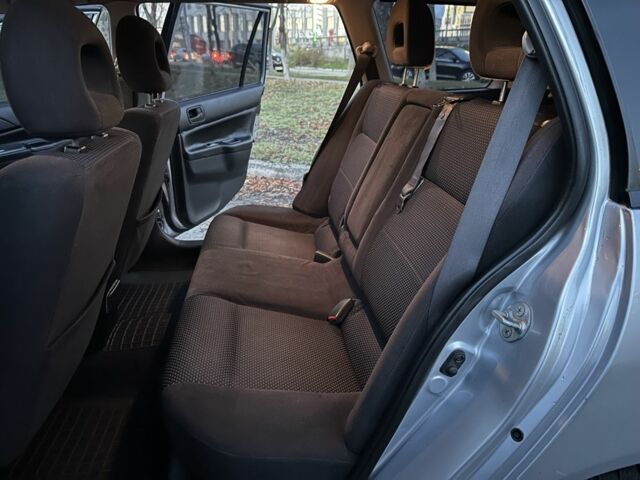 Серый Мицубиси Лансер, объемом двигателя 1.6 л и пробегом 220 тыс. км за 3999 $, фото 8 на Automoto.ua