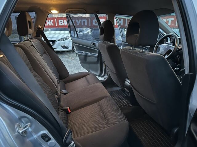 Серый Мицубиси Лансер, объемом двигателя 1.6 л и пробегом 220 тыс. км за 3999 $, фото 9 на Automoto.ua