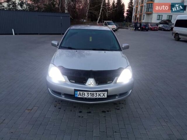Сірий Міцубісі Lancer, об'ємом двигуна 1.58 л та пробігом 258 тис. км за 2999 $, фото 8 на Automoto.ua