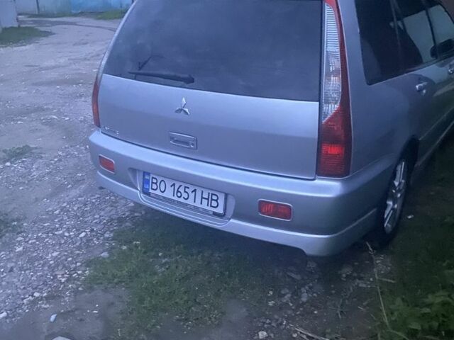 Серый Мицубиси Лансер, объемом двигателя 2 л и пробегом 250 тыс. км за 4058 $, фото 6 на Automoto.ua