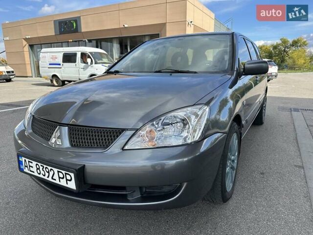 Сірий Міцубісі Lancer, об'ємом двигуна 1.59 л та пробігом 279 тис. км за 4999 $, фото 11 на Automoto.ua