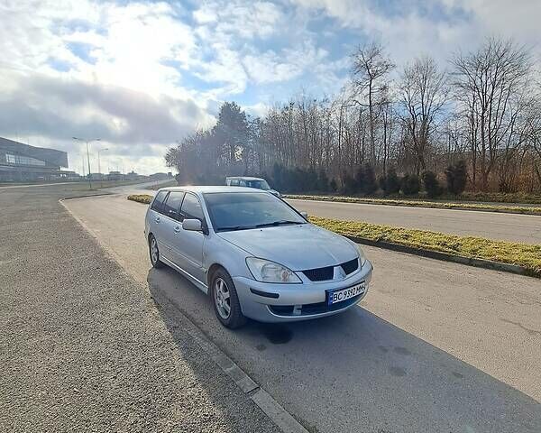 Сірий Міцубісі Lancer, об'ємом двигуна 1.6 л та пробігом 315 тис. км за 4250 $, фото 11 на Automoto.ua