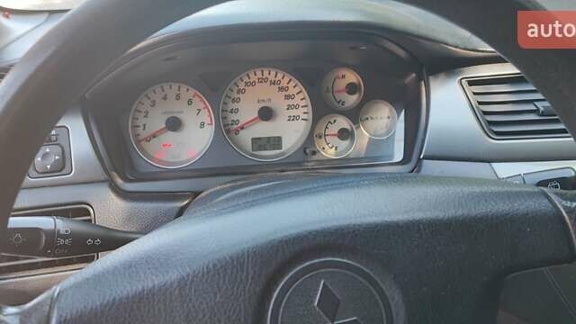 Сірий Міцубісі Lancer, об'ємом двигуна 1.6 л та пробігом 186 тис. км за 4200 $, фото 7 на Automoto.ua