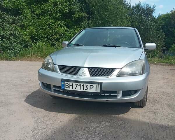 Сірий Міцубісі Lancer, об'ємом двигуна 1.6 л та пробігом 240 тис. км за 5000 $, фото 15 на Automoto.ua