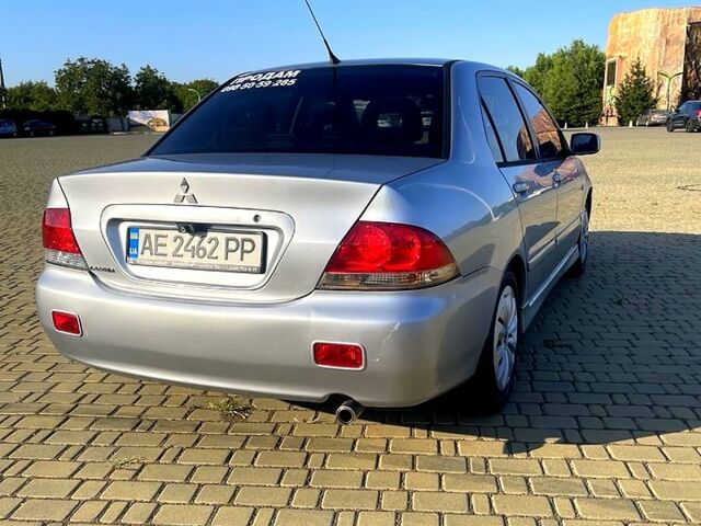 Сірий Міцубісі Lancer, об'ємом двигуна 1.6 л та пробігом 241 тис. км за 4950 $, фото 4 на Automoto.ua