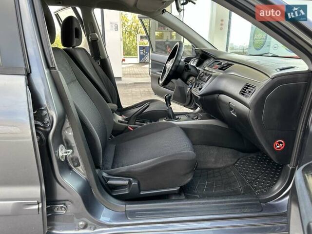 Сірий Міцубісі Lancer, об'ємом двигуна 1.59 л та пробігом 279 тис. км за 4999 $, фото 35 на Automoto.ua