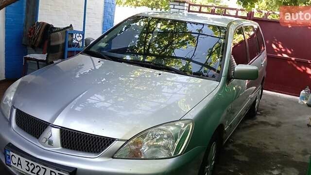 Сірий Міцубісі Lancer, об'ємом двигуна 1.6 л та пробігом 186 тис. км за 4200 $, фото 1 на Automoto.ua
