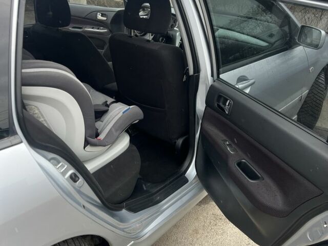 Сірий Міцубісі Lancer, об'ємом двигуна 1.6 л та пробігом 270 тис. км за 5000 $, фото 3 на Automoto.ua