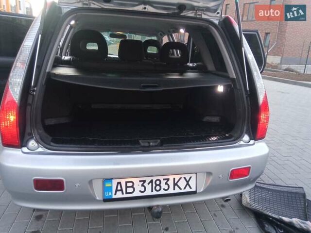 Сірий Міцубісі Lancer, об'ємом двигуна 1.58 л та пробігом 258 тис. км за 2999 $, фото 21 на Automoto.ua