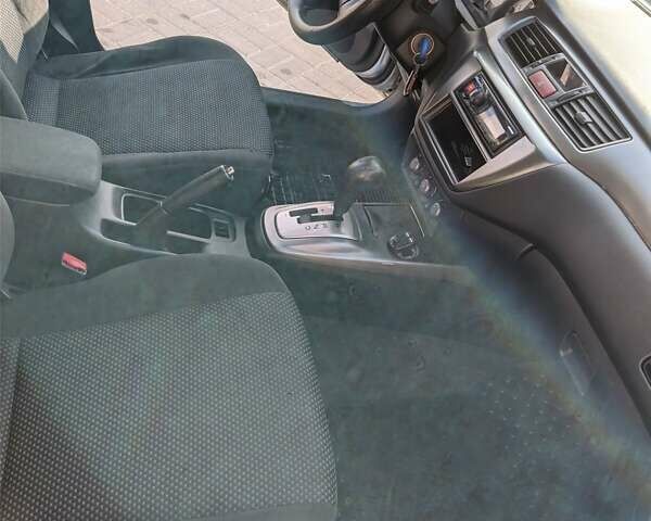 Сірий Міцубісі Lancer, об'ємом двигуна 1.58 л та пробігом 220 тис. км за 4499 $, фото 32 на Automoto.ua