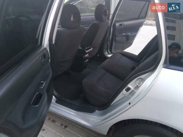 Сірий Міцубісі Lancer, об'ємом двигуна 1.58 л та пробігом 258 тис. км за 2999 $, фото 19 на Automoto.ua