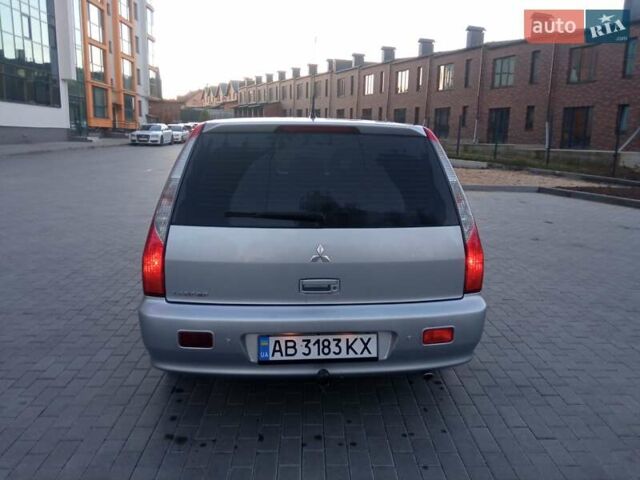 Сірий Міцубісі Lancer, об'ємом двигуна 1.58 л та пробігом 258 тис. км за 2999 $, фото 4 на Automoto.ua