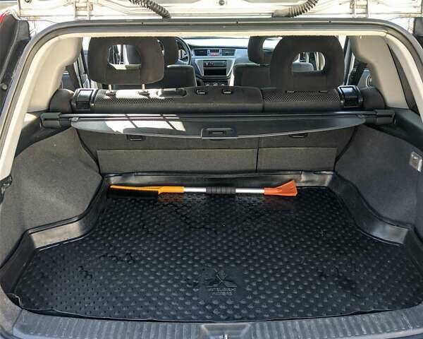 Сірий Міцубісі Lancer, об'ємом двигуна 1.58 л та пробігом 220 тис. км за 4499 $, фото 37 на Automoto.ua