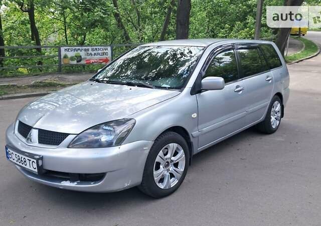 Сірий Міцубісі Lancer, об'ємом двигуна 1.6 л та пробігом 244 тис. км за 4200 $, фото 2 на Automoto.ua