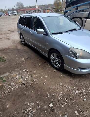 Серый Мицубиси Лансер, объемом двигателя 1.58 л и пробегом 223 тыс. км за 3200 $, фото 6 на Automoto.ua