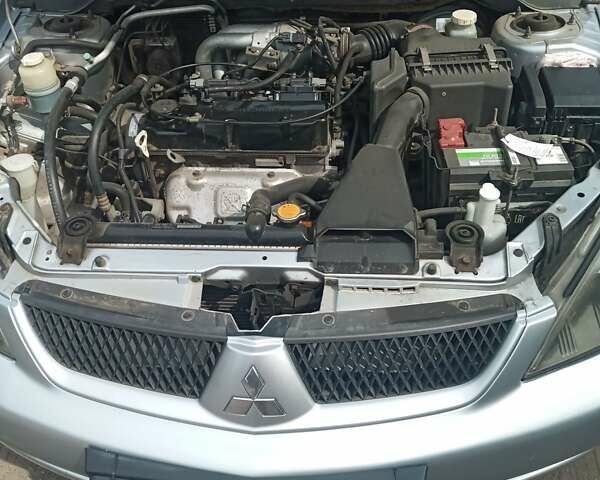 Сірий Міцубісі Lancer, об'ємом двигуна 1.6 л та пробігом 240 тис. км за 5000 $, фото 19 на Automoto.ua