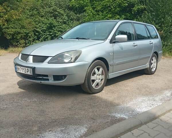 Сірий Міцубісі Lancer, об'ємом двигуна 1.6 л та пробігом 240 тис. км за 5000 $, фото 1 на Automoto.ua