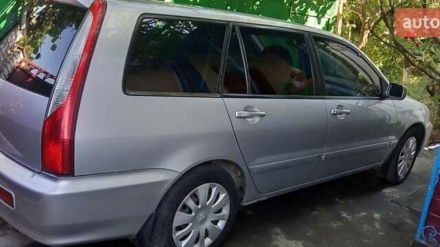 Сірий Міцубісі Lancer, об'ємом двигуна 1.6 л та пробігом 186 тис. км за 4200 $, фото 2 на Automoto.ua