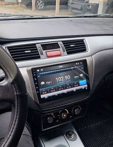 Серый Мицубиси Лансер, объемом двигателя 1.58 л и пробегом 223 тыс. км за 3200 $, фото 13 на Automoto.ua