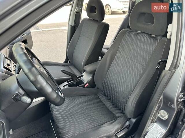 Сірий Міцубісі Lancer, об'ємом двигуна 1.59 л та пробігом 279 тис. км за 4999 $, фото 22 на Automoto.ua