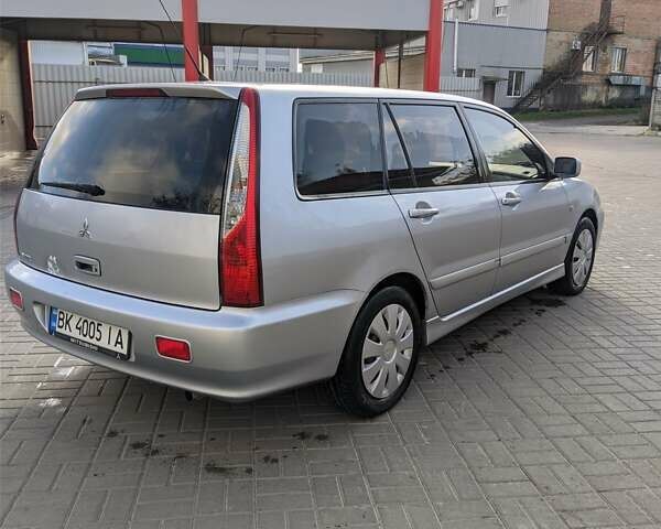 Сірий Міцубісі Lancer, об'ємом двигуна 1.58 л та пробігом 220 тис. км за 4499 $, фото 14 на Automoto.ua