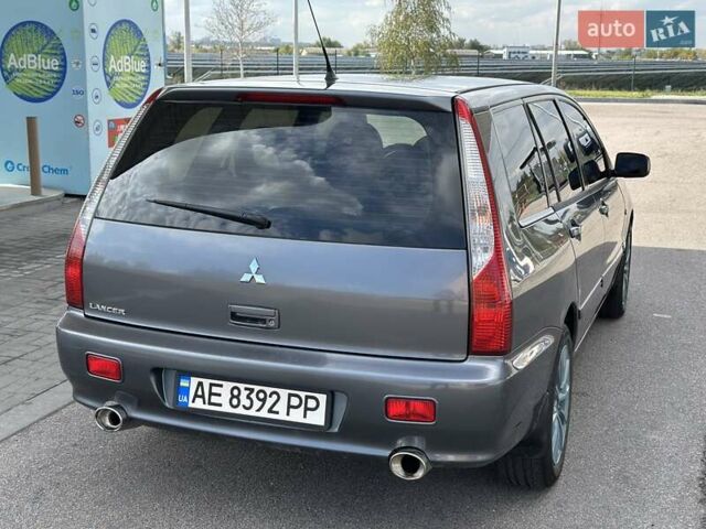 Сірий Міцубісі Lancer, об'ємом двигуна 1.59 л та пробігом 279 тис. км за 4999 $, фото 20 на Automoto.ua