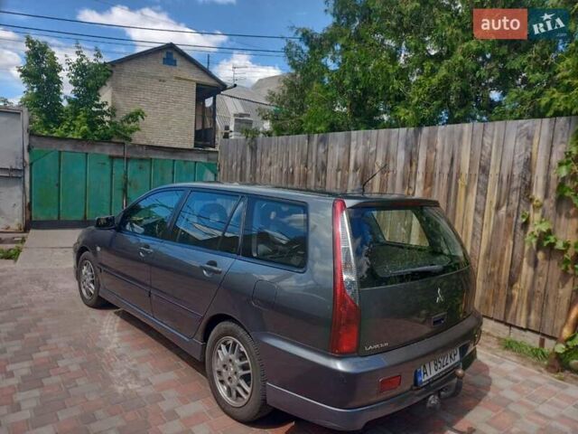 Сірий Міцубісі Lancer, об'ємом двигуна 1.6 л та пробігом 279 тис. км за 5800 $, фото 34 на Automoto.ua