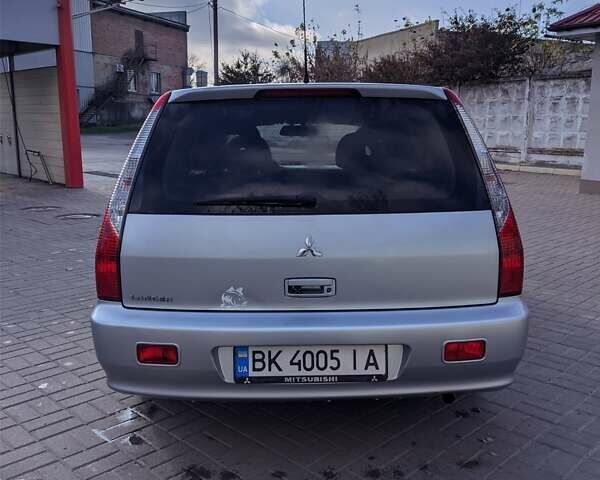 Сірий Міцубісі Lancer, об'ємом двигуна 1.58 л та пробігом 220 тис. км за 4499 $, фото 20 на Automoto.ua