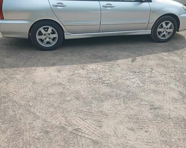 Сірий Міцубісі Lancer, об'ємом двигуна 1.6 л та пробігом 240 тис. км за 5000 $, фото 10 на Automoto.ua