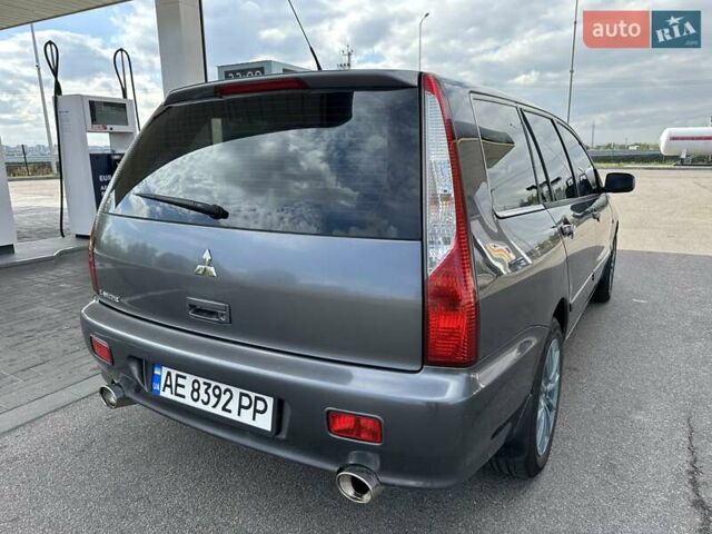 Сірий Міцубісі Lancer, об'ємом двигуна 1.59 л та пробігом 279 тис. км за 4999 $, фото 15 на Automoto.ua