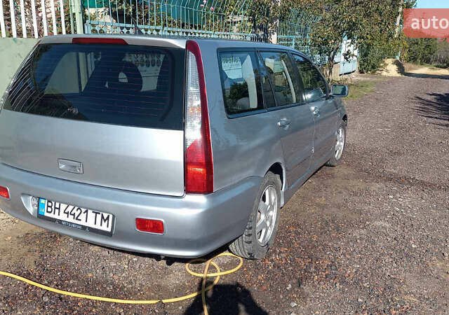 Серый Мицубиси Лансер, объемом двигателя 1.58 л и пробегом 296 тыс. км за 3850 $, фото 7 на Automoto.ua