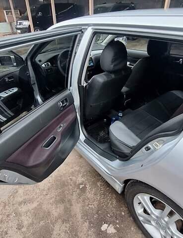 Серый Мицубиси Лансер, объемом двигателя 1.58 л и пробегом 223 тыс. км за 3200 $, фото 7 на Automoto.ua