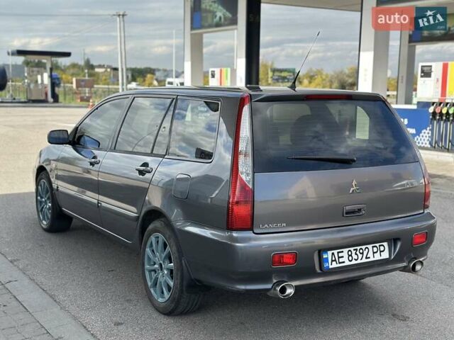 Сірий Міцубісі Lancer, об'ємом двигуна 1.59 л та пробігом 279 тис. км за 4999 $, фото 16 на Automoto.ua