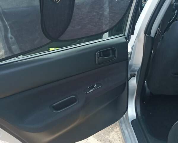 Сірий Міцубісі Lancer, об'ємом двигуна 1.6 л та пробігом 240 тис. км за 5000 $, фото 5 на Automoto.ua