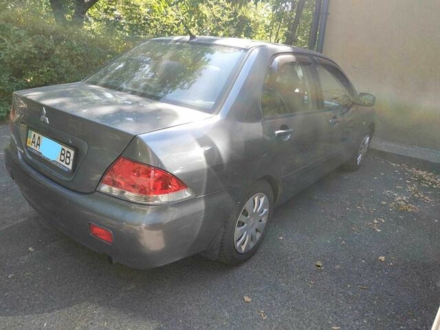 Серый Мицубиси Лансер, объемом двигателя 1.6 л и пробегом 178 тыс. км за 4000 $, фото 4 на Automoto.ua