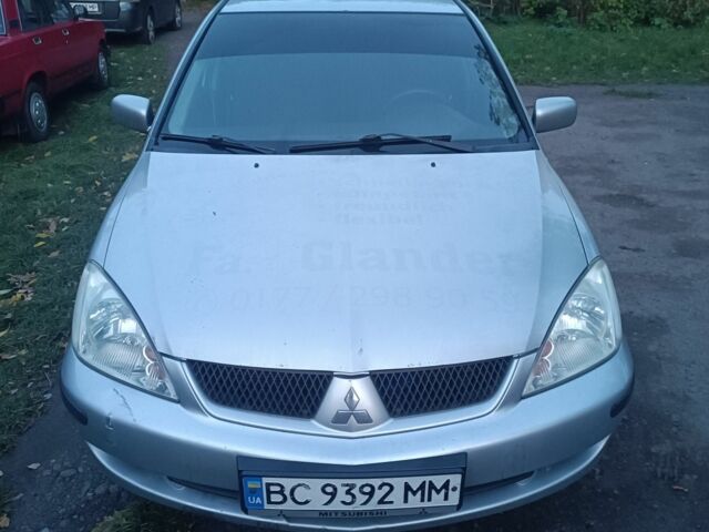 Сірий Міцубісі Lancer, об'ємом двигуна 1.6 л та пробігом 399 тис. км за 2950 $, фото 4 на Automoto.ua