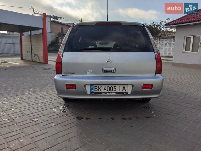 Сірий Міцубісі Lancer, об'ємом двигуна 1.58 л та пробігом 220 тис. км за 4499 $, фото 21 на Automoto.ua