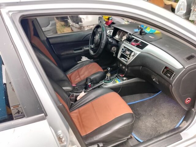 Серый Мицубиси Лансер, объемом двигателя 2 л и пробегом 3 тыс. км за 4520 $, фото 4 на Automoto.ua