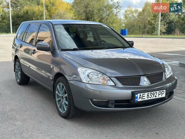 Сірий Міцубісі Lancer, об'ємом двигуна 1.59 л та пробігом 279 тис. км за 4999 $, фото 9 на Automoto.ua