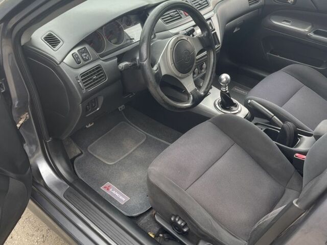 Сірий Міцубісі Lancer, об'ємом двигуна 2 л та пробігом 257 тис. км за 5000 $, фото 6 на Automoto.ua