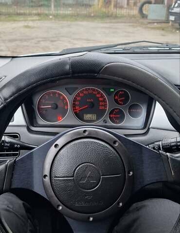 Серый Мицубиси Лансер, объемом двигателя 1.58 л и пробегом 223 тыс. км за 3200 $, фото 14 на Automoto.ua