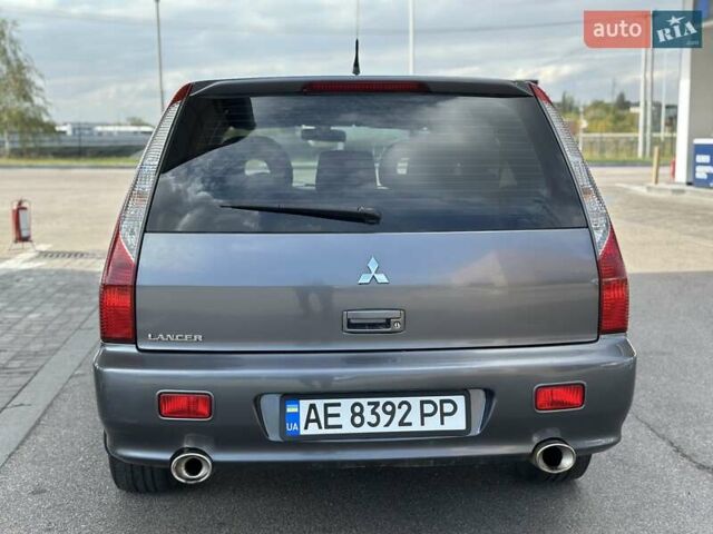 Сірий Міцубісі Lancer, об'ємом двигуна 1.59 л та пробігом 279 тис. км за 4999 $, фото 17 на Automoto.ua