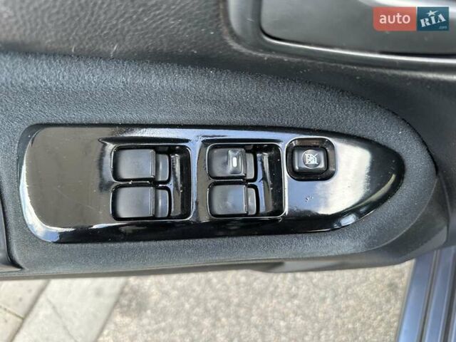 Сірий Міцубісі Lancer, об'ємом двигуна 1.59 л та пробігом 279 тис. км за 4999 $, фото 26 на Automoto.ua