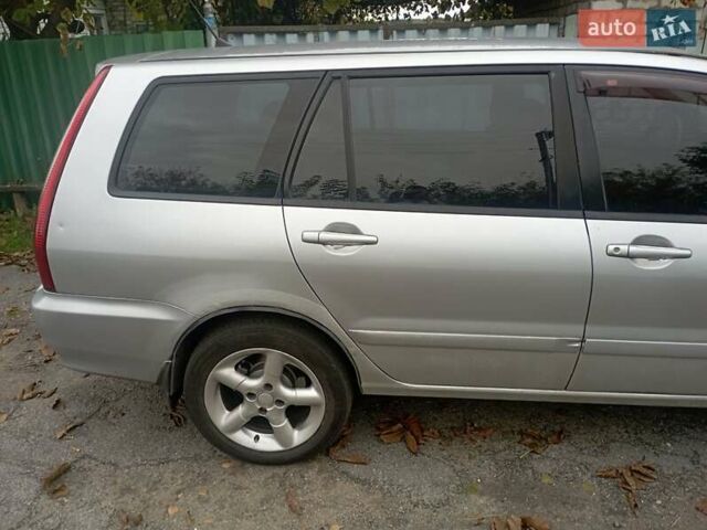 Серый Мицубиси Лансер, объемом двигателя 1.6 л и пробегом 350 тыс. км за 2700 $, фото 7 на Automoto.ua