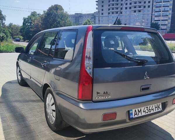 Сірий Міцубісі Lancer, об'ємом двигуна 1.58 л та пробігом 240 тис. км за 4100 $, фото 1 на Automoto.ua