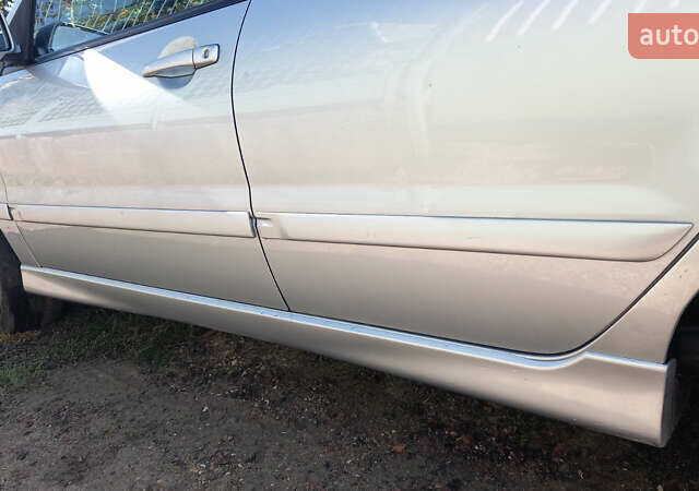 Серый Мицубиси Лансер, объемом двигателя 1.58 л и пробегом 296 тыс. км за 3850 $, фото 5 на Automoto.ua